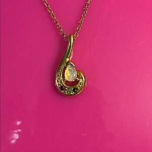 Elegant Gold Pendant Necklace with Gemstone Accents